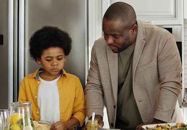 family preparing food in the kitchen